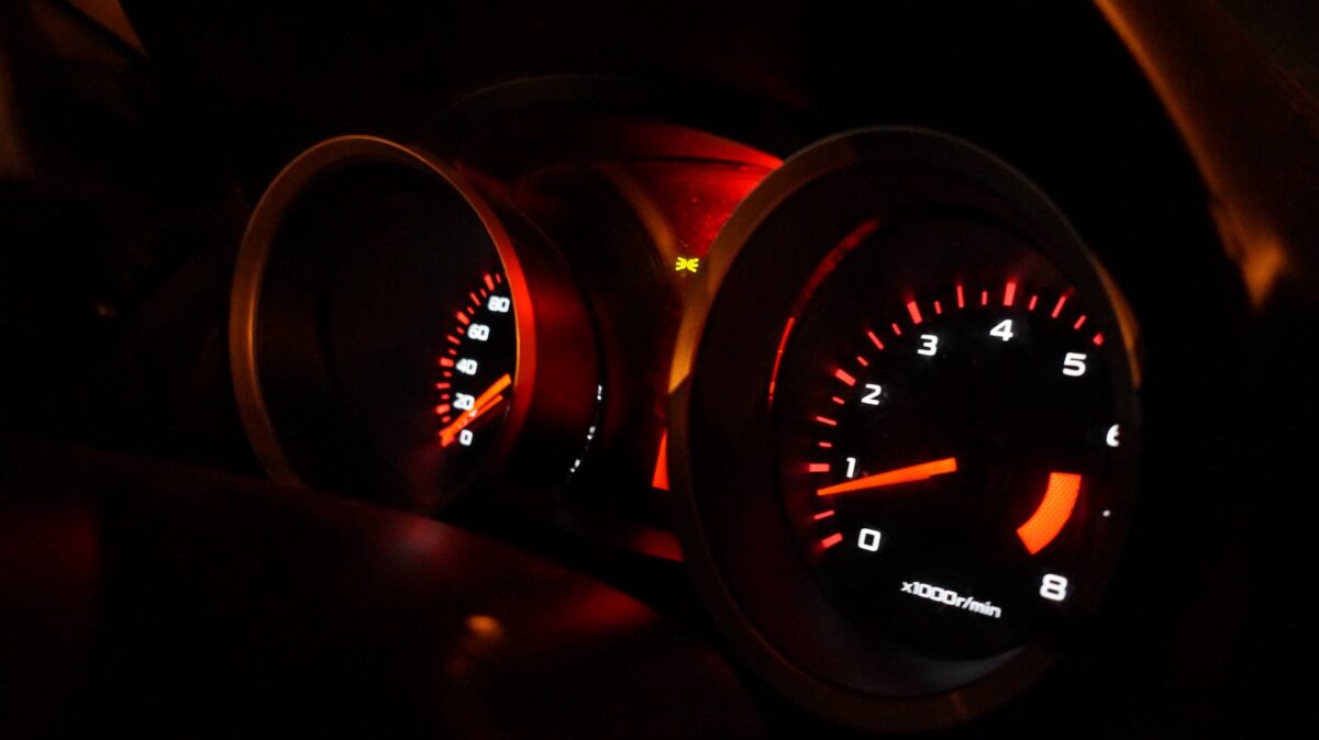 selective focus photography of a speedometer